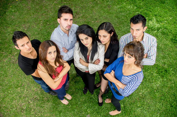 Group of serious hispanic young people in the park - Foto, immagini