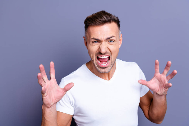 Close up photo amazing he him his middle age macho hands arms raised up air yelling full anger outraged rage grin teeth I would kill you look wear casual white t-shirt isolated grey background - Foto, Bild