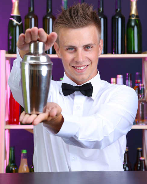 Portrait of handsome barman with shaker, at bar - Φωτογραφία, εικόνα