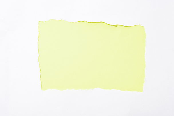 白い破れた紙の穴のライムグリーンカラフルな背景 - 写真・画像