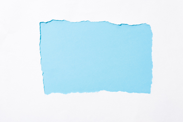 sfondo azzurro colorato in bianco strappato buco di carta
 - Foto, immagini