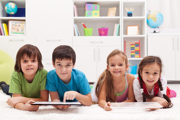 Happy kids with tablet computers - Fotó, kép