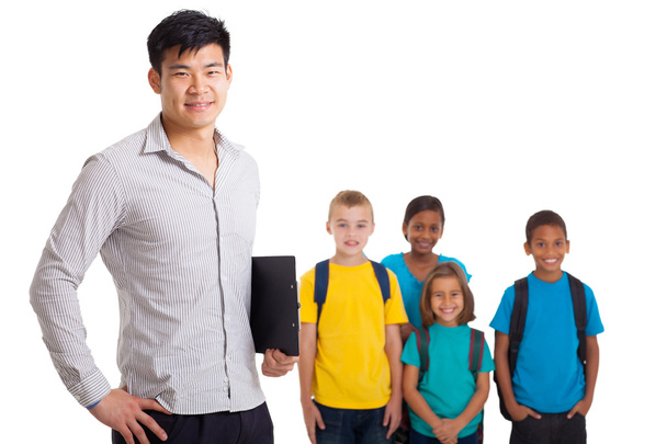 male teacher and young school kids - Photo, image