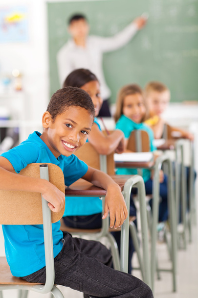 elementary school boy in classroom looking - Photo, Image