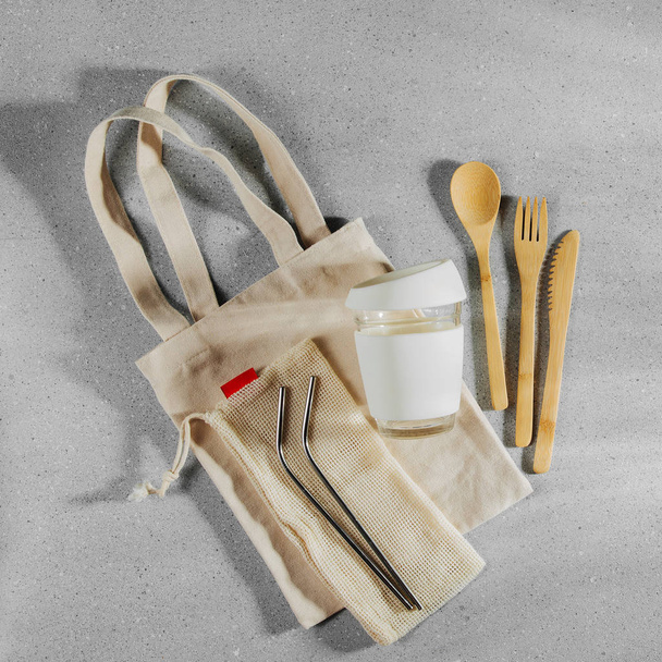 Set of Eco friendly bamboo cutlery, eco bag and reusable coffee mug - Fotografie, Obrázek