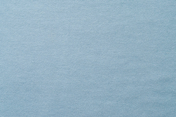 Textura de tela lisa de algodón azul claro. De cerca. Fondo abstracto y textura para el diseño
. - Foto, imagen