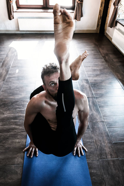 complicated yoga asana - Фото, изображение