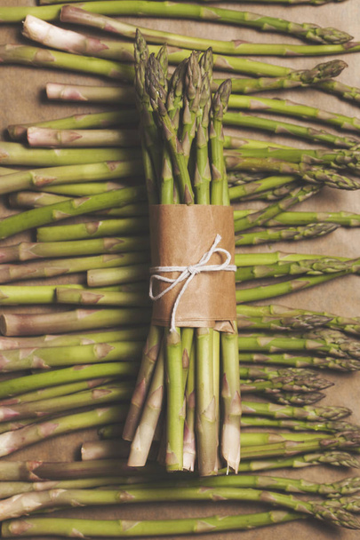 A bunch of fresh asparagus - Фото, изображение