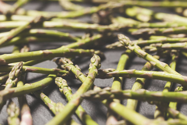 Fresh asparagus on a rustic slate background - Zdjęcie, obraz