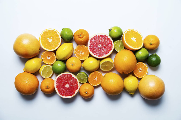 Citrus fuits, grapefruit, lemon, lime, orange background - Photo, image