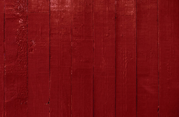 Red background of planks tightly knocked together. Red wooden ba - Foto, Imagem
