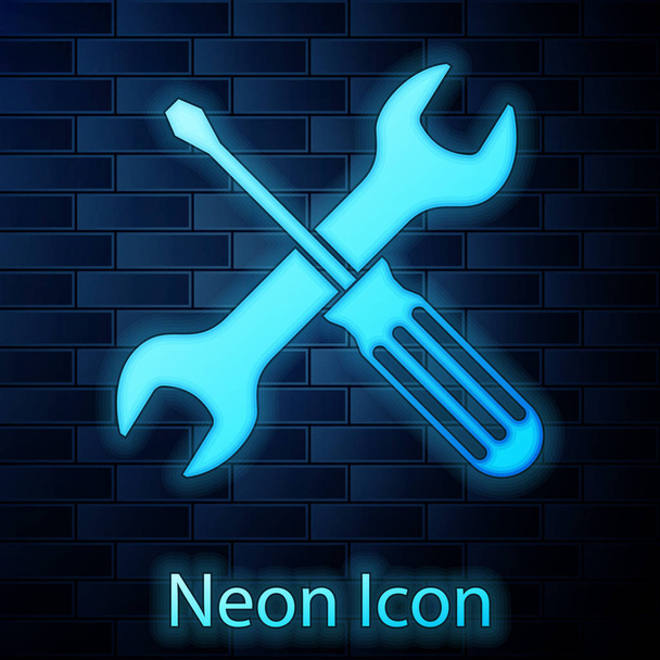 Świecące Neon skrzyżowane śrubokręt i klucz narzędzia ikona izolowane na tle muru ceglanego. Symbol narzędzia serwisowego. Ilustracja wektorowa - Wektor, obraz