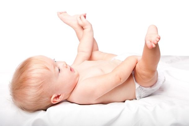 Cute infant laying on back - Foto, imagen