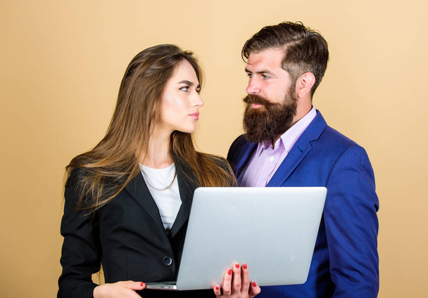 Business meeting. Man bearded manager show financial report laptop. Discussing progress. Woman and guy colleague working together. Business plan. Business lady and director or boss surfing internet - Foto, Imagen