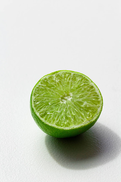 Lime on a white background close up - Photo, Image