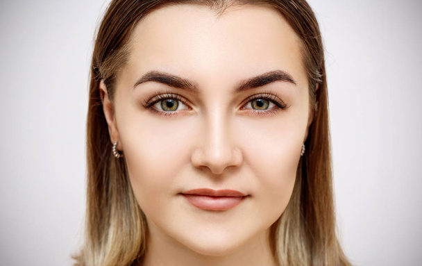 Front view on beautiful female face with perfect skin. - Fotografie, Obrázek