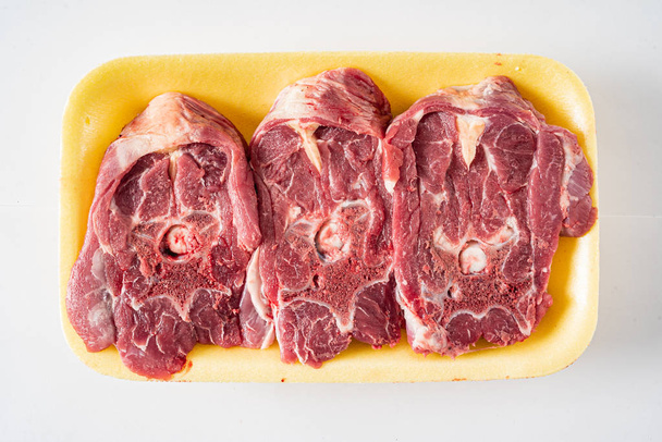 mutton meat on the white background, close up - Foto, afbeelding