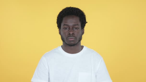 Sick Young African Man Coughing Isolated on Yellow Background - Filmati, video