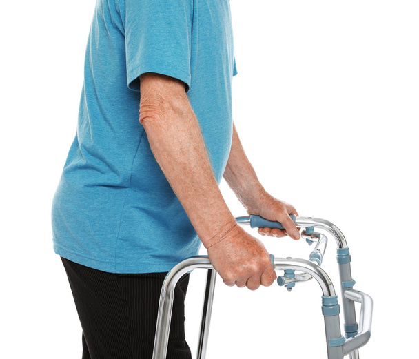 Elderly man using walking frame isolated on white, closeup - Photo, image