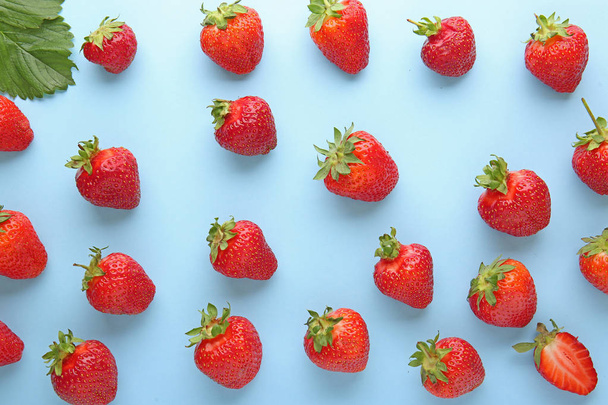 Sweet ripe strawberry on color background - Фото, изображение