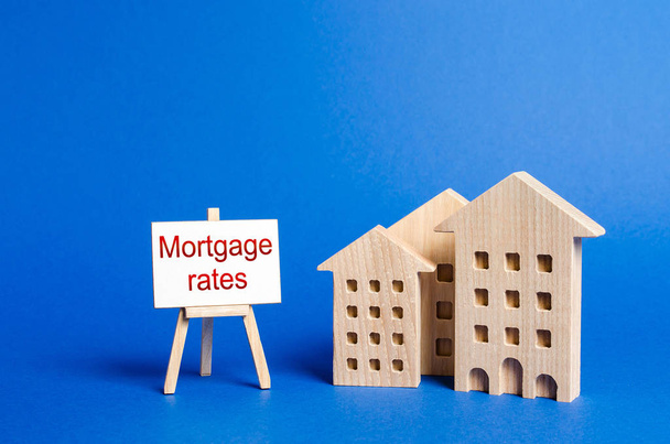 House buildings and mortgage rates. Affordable housing and real estate market competition. Raising mortgage rates and tax. The increase in interest charges. Loan for housing, apartment - Φωτογραφία, εικόνα