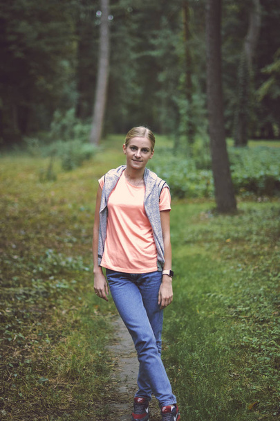 Young woman in the park or forest - Fotografie, Obrázek