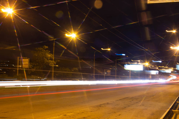 Night road. Frozen light lanterns. Freezligt - Fotoğraf, Görsel