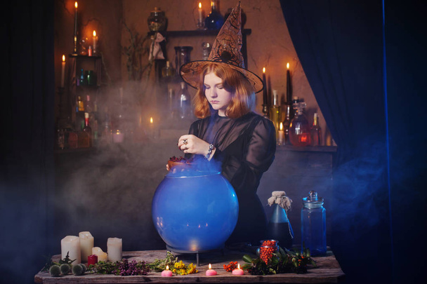 young witch in home. Halloween concept - Foto, Bild