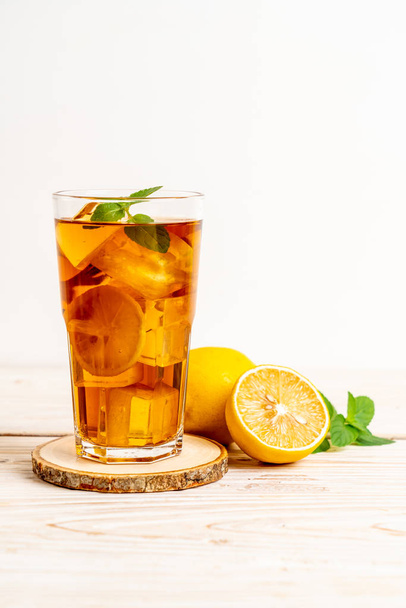 glass of ice lemon tea - Fotó, kép