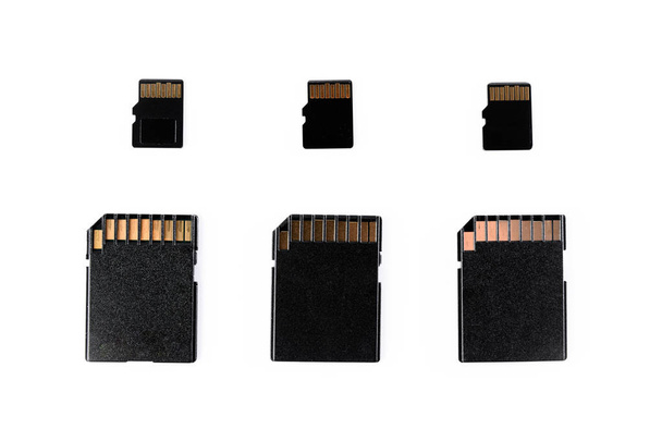 three sd cards and three micro sd isolated in white background - Photo, Image