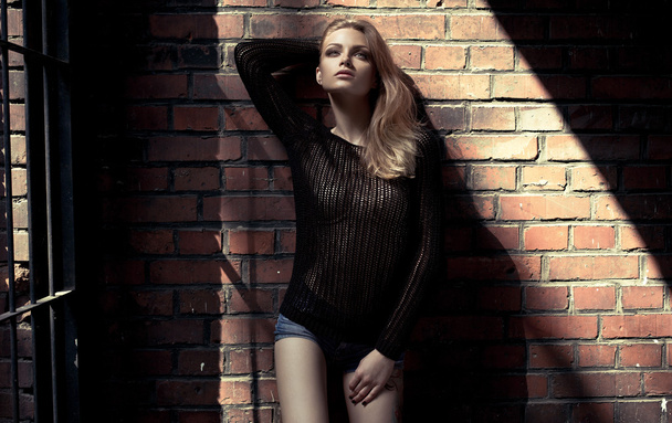 Fashion blond model posing outdoor - Фото, зображення