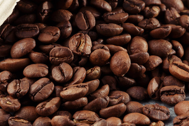 Isolated coffee bean. closeup photo. Top view. Roasted coffee beans background - Fotoğraf, Görsel