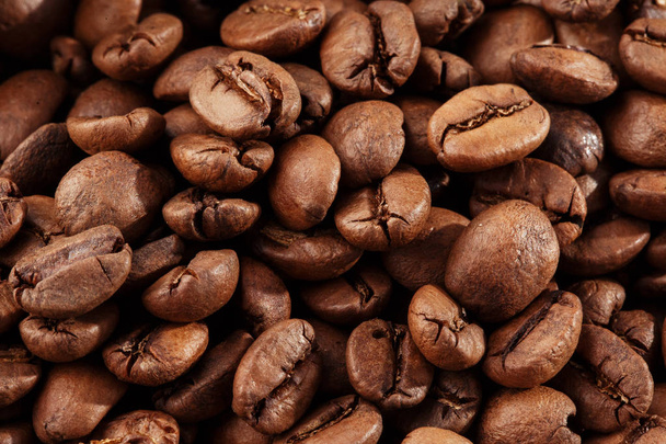 Isolated coffee bean. closeup photo. Top view. Roasted coffee beans background - Фото, зображення