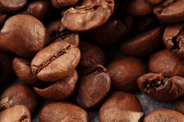 Isolated coffee bean. closeup photo. Top view. Roasted coffee beans background - Photo, Image