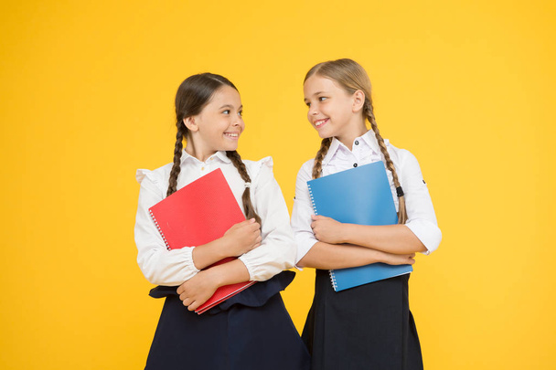 Bring child school few days prior play playground and get comfortable. Cheerful school girls. Point out positive aspects starting school create positive anticipation first day class. Back to school - Фото, изображение