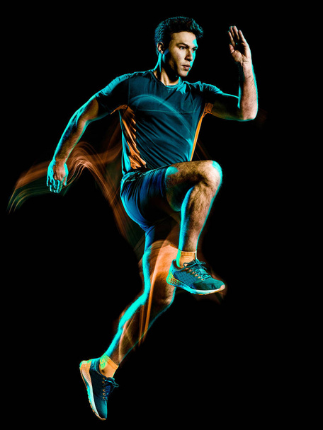 runner running jogger jogging man isolated light painting black background - 写真・画像