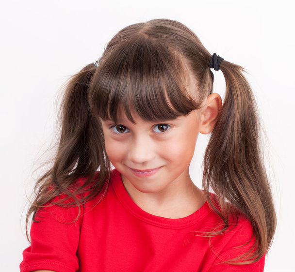 Little girl in a red T-shirt - Фото, зображення