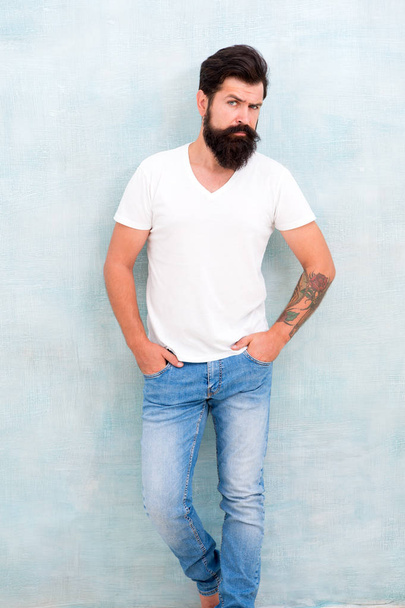 Fashion and beauty. Hipster long well groomed beard and mustache. Casual style daily life. Male temper brutality. Brutal macho casual outfit gray background. Simple and casual. Masculinity concept - Zdjęcie, obraz
