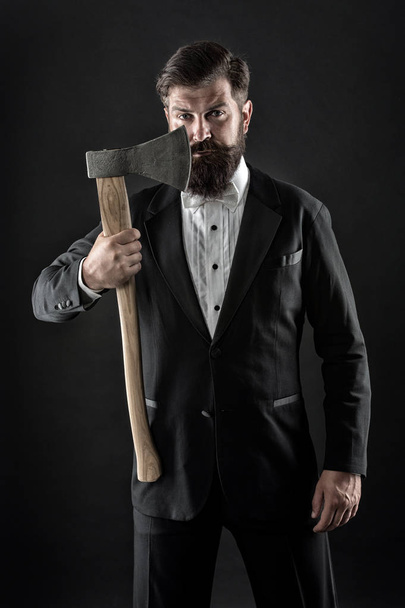 Barbershop hairstyle. Brutal barber. Brutal manners. Resoluteness concept. Own opinion. Decision was made. Man brutal hipster with axe. Sharp ax hand confident guy. Masculinity and brutality - Фото, зображення