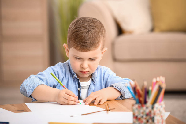 Cute little boy drawing at home - Φωτογραφία, εικόνα