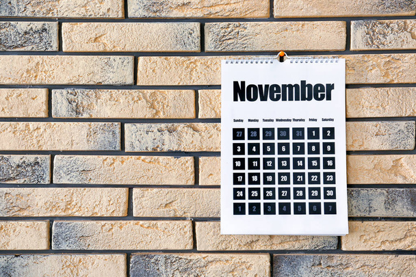 Flip calendar hanging on wall - Foto, imagen