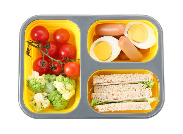 Lunch box ze smacznym jedzeniem na białym tle - Zdjęcie, obraz