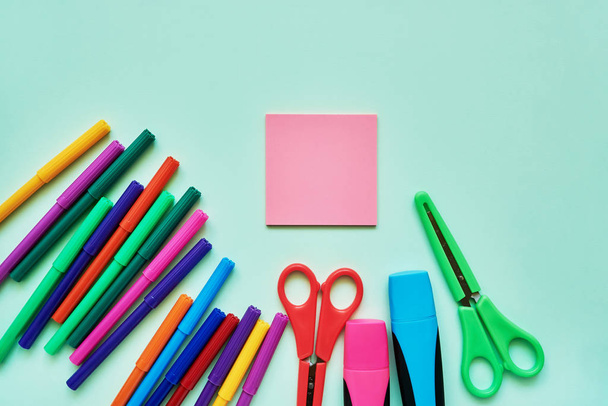 School subjects on green background. Back to school concept. Flat lay, copy space. - Photo, Image