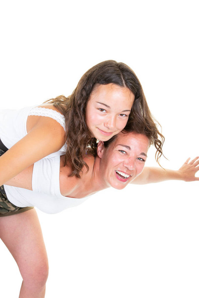 Fun loving duo of mother and teenager daughter - Photo, Image