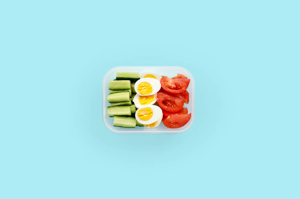 Healthy fitness food in container. Sport food minimalism - 写真・画像