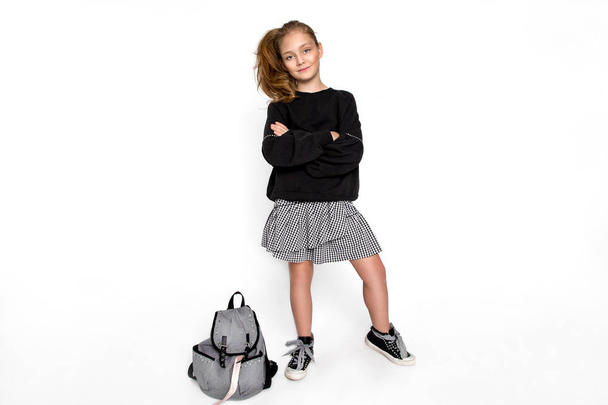 Back to school. Cute child girl with backpack running and going to school with fun - Image - Fotografie, Obrázek