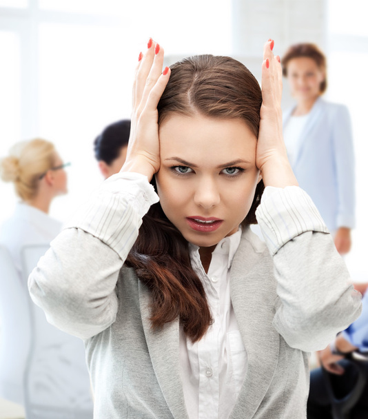 Stressed businesswoman in office - Photo, image