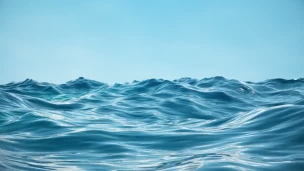 Море або океан, хвилі крупним планом. Блакитні хвилі морська вода. Блакитна кристально чиста вода. Можна побачити піщане морське дно. Вид на морську хвилю під низьким кутом. 3D 4K анімація
 - Кадри, відео