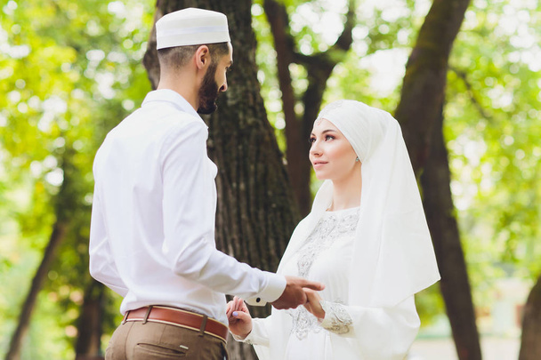 National wedding. Bride and groom. Wedding muslim couple during the marriage ceremony. Muslim marriage. - 写真・画像