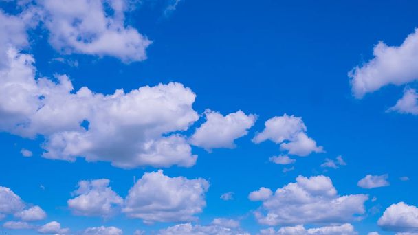 Blue sky with clouds in summer sunny day - Fotografie, Obrázek